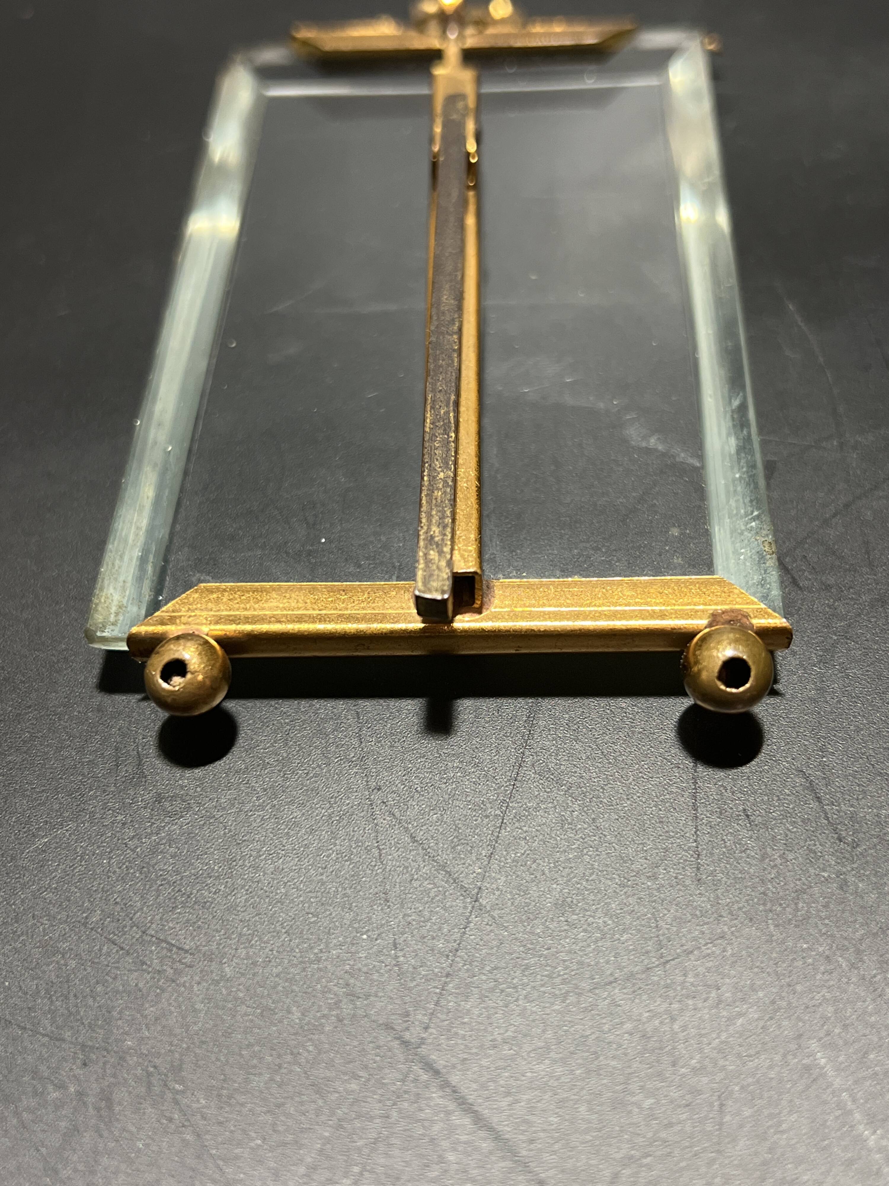 Glass and metal frame