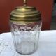 Glass cookie jar engraved metal frame brass