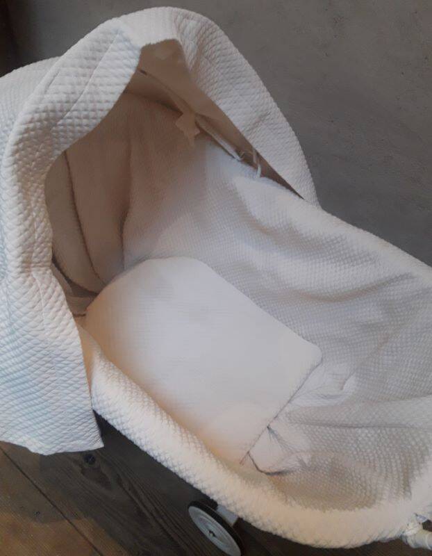 Wicker and painted wood baby cradle