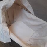Wicker and painted wood baby cradle