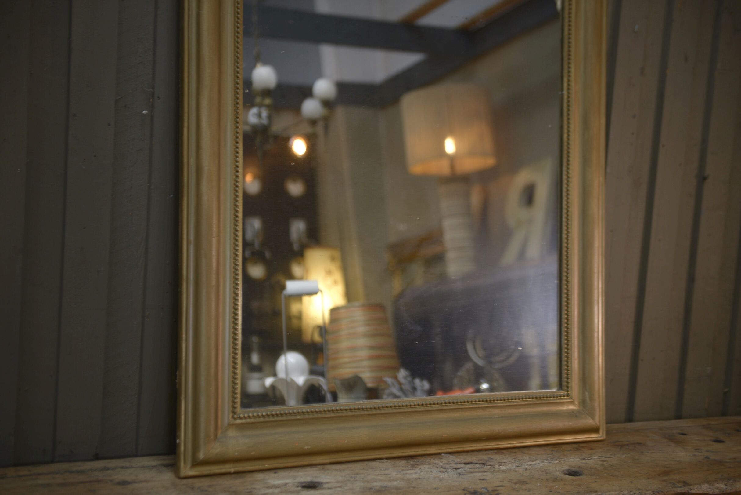 Old mirror in gilded wood 19th