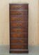 Large tall mahogany cabinet with four drawers and a leather top.