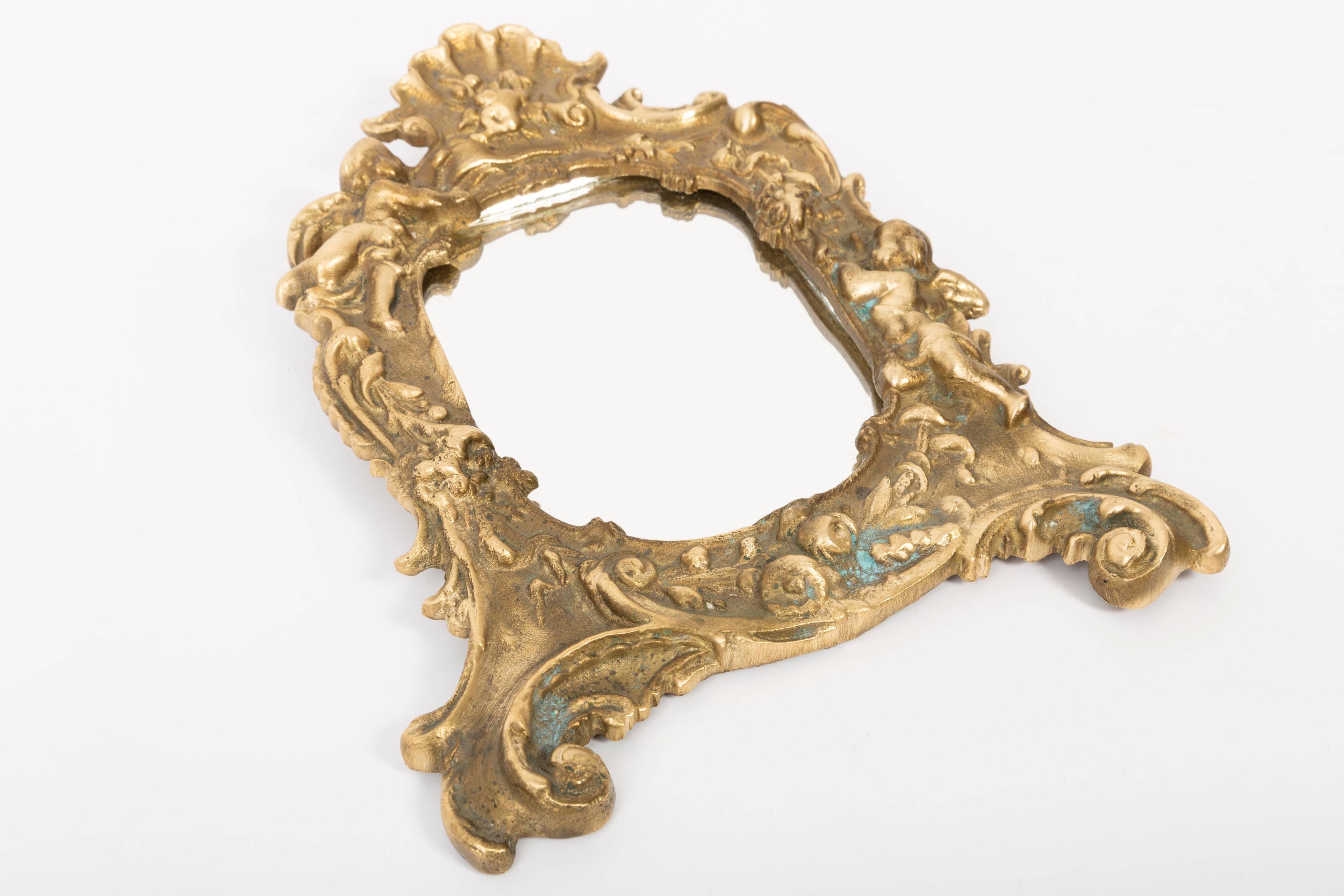 Miniature vintage gold mirror with angels, Italy, 1960s