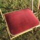 Pair of foldable red velvet chairs