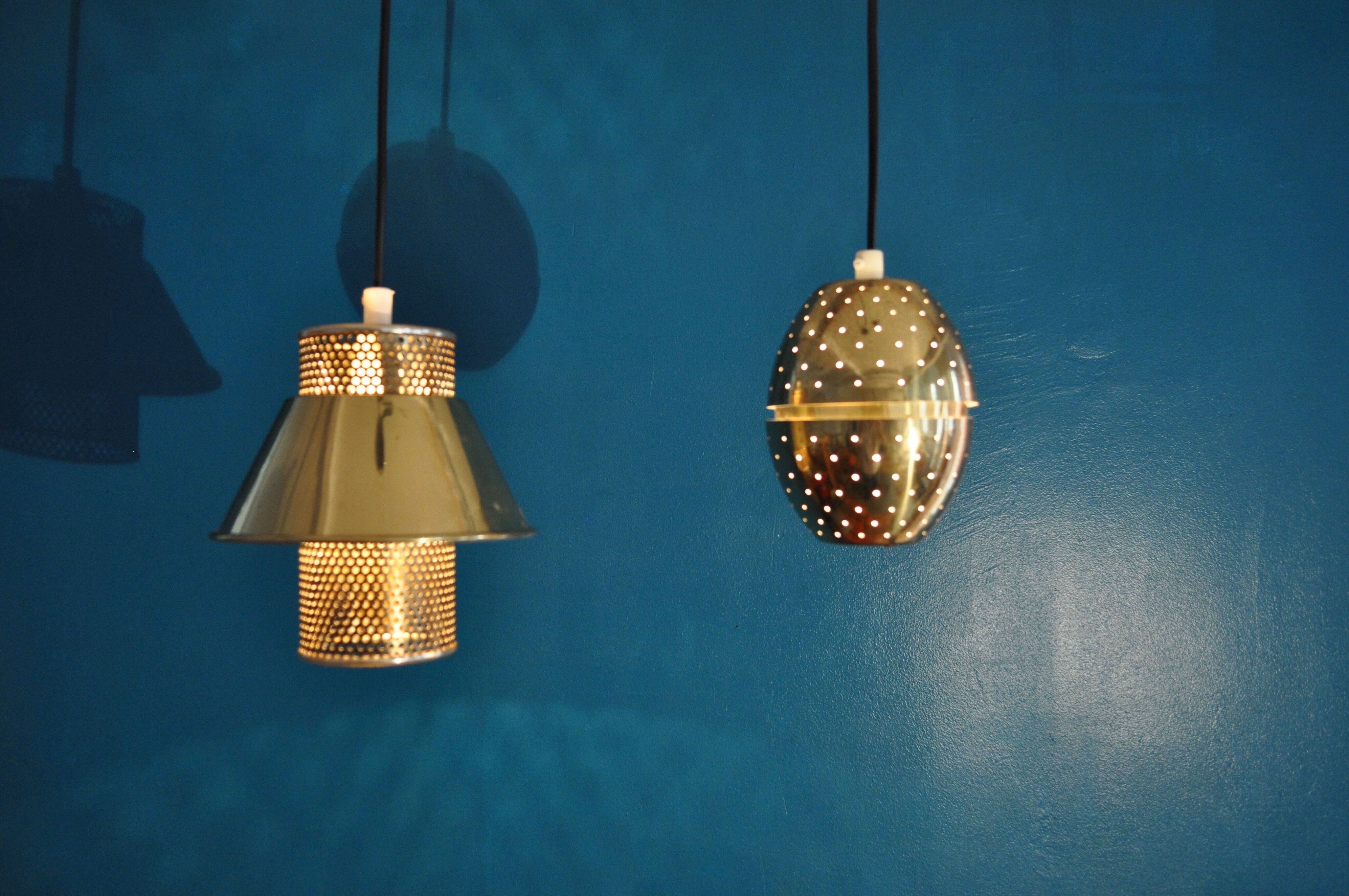 Pair of hanging lamps brass perforated Hans - Agne Jakobsson, 1960