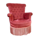 Fauteuil crapaud rose capitonné
