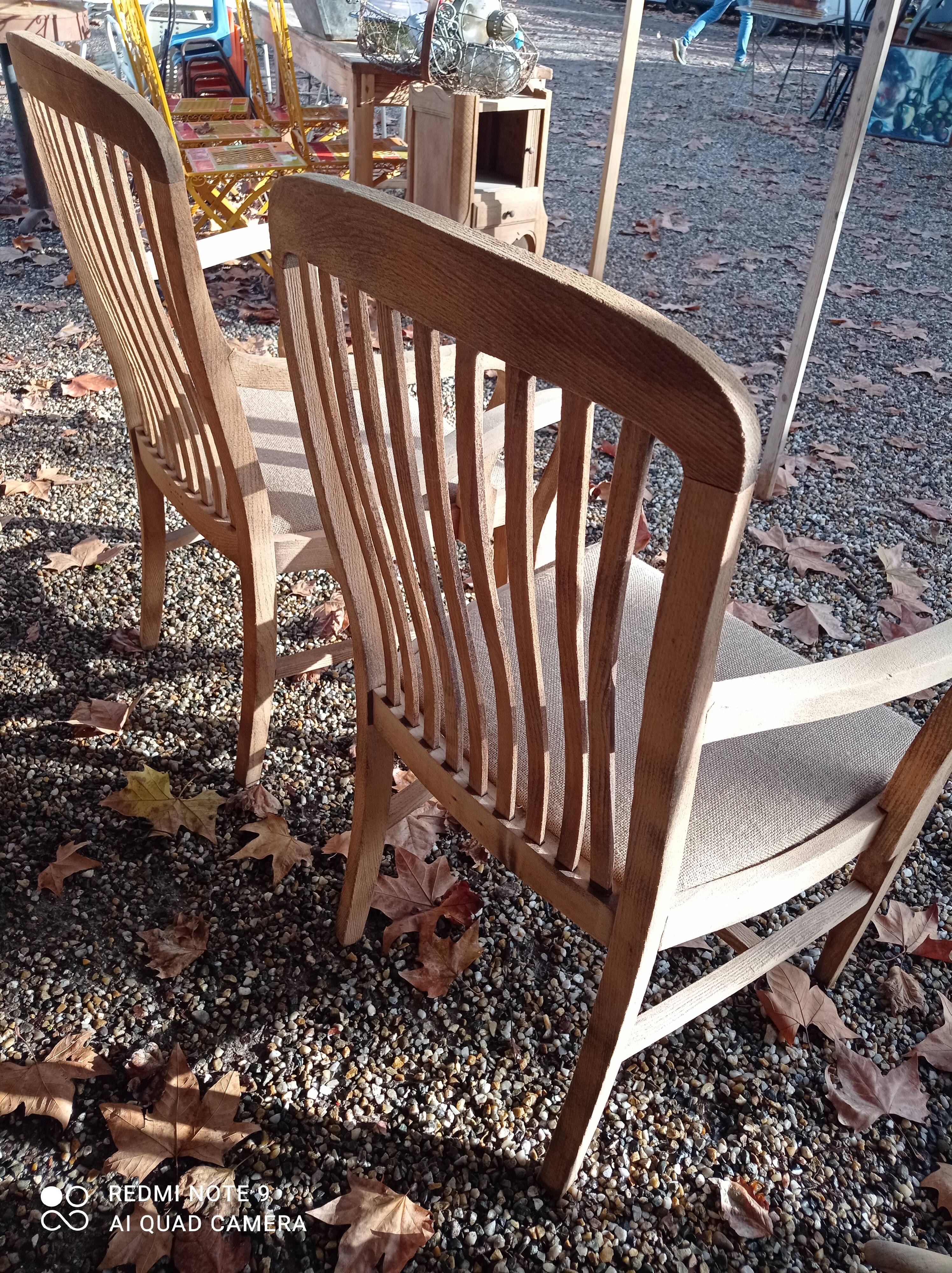 Paire de fauteuils en chêne et tissu lin