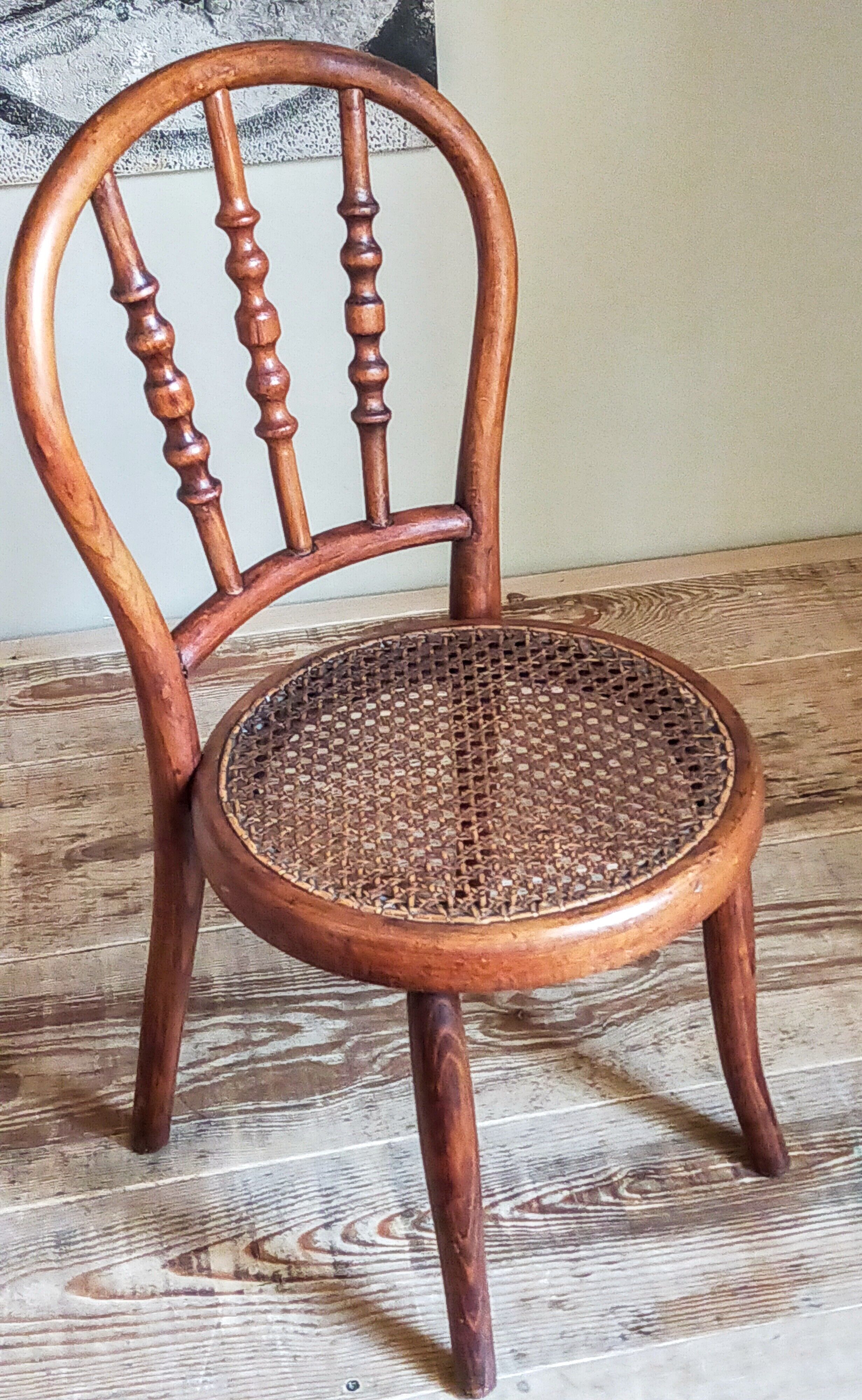 Children's chair in curved round wood old year