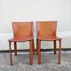Postmodern pair of leather chairs by Giancarlo Vegni for Fasem 1984