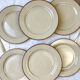 6 flat plates in speckled beige stoneware Tulowice Poland 1970