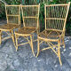 Lot de quatre chaises en rotin