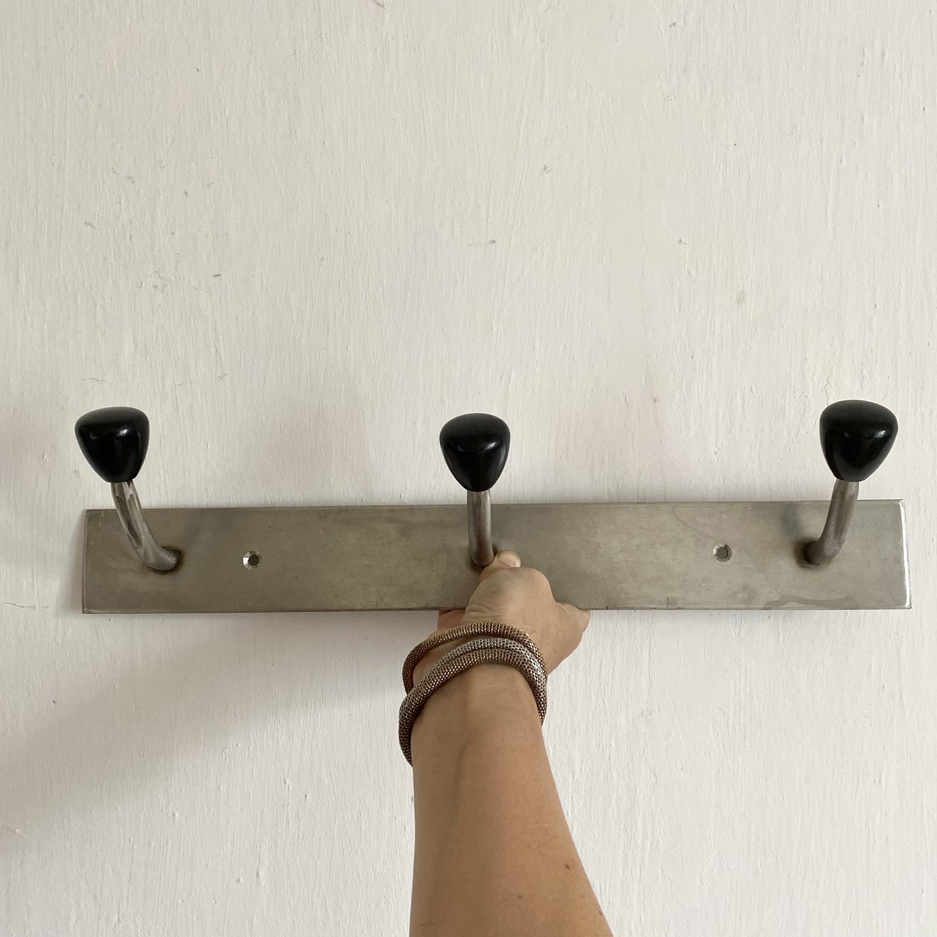 Industrial wall coat rack, 50s