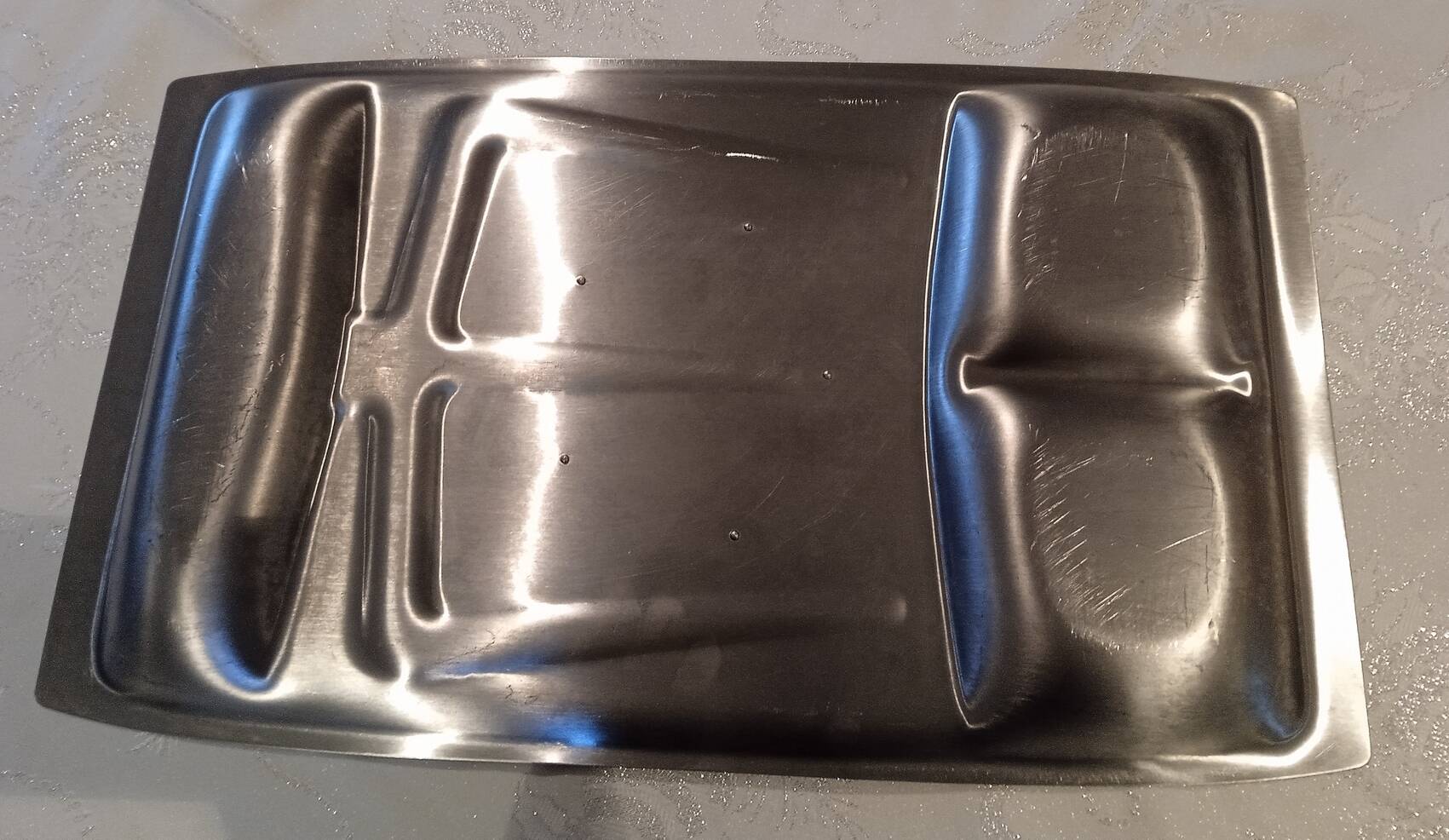 Stainless steel lamb dish