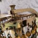Brass wall light with crystal pendants
