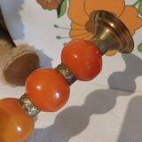 Copper and orange resin candlestick