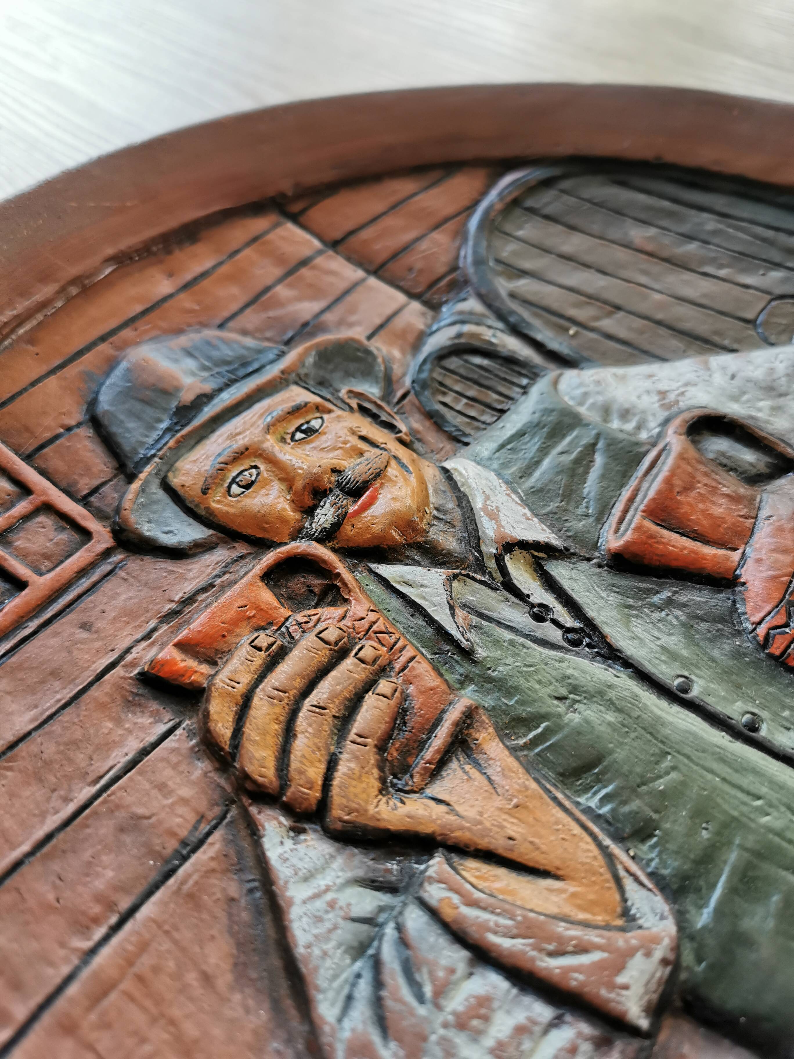 Vintage Embossed Clay Plate: Man Drinking, Retro Wall Decor