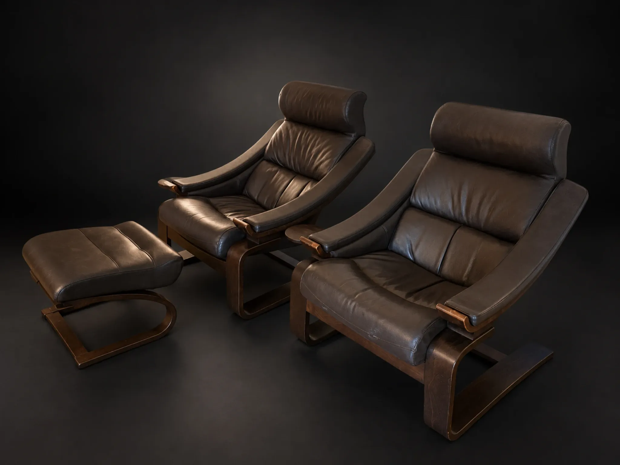 Pair of Kroken armchairs and ottoman — Åke Fribyter, marketed p