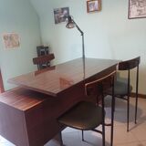 Desk and 3 chairs in 1950s Italian modernist style in rosewood.