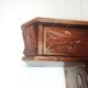 Carved wood side table. 1950s