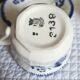 Antique cups with iron earthenware saucers