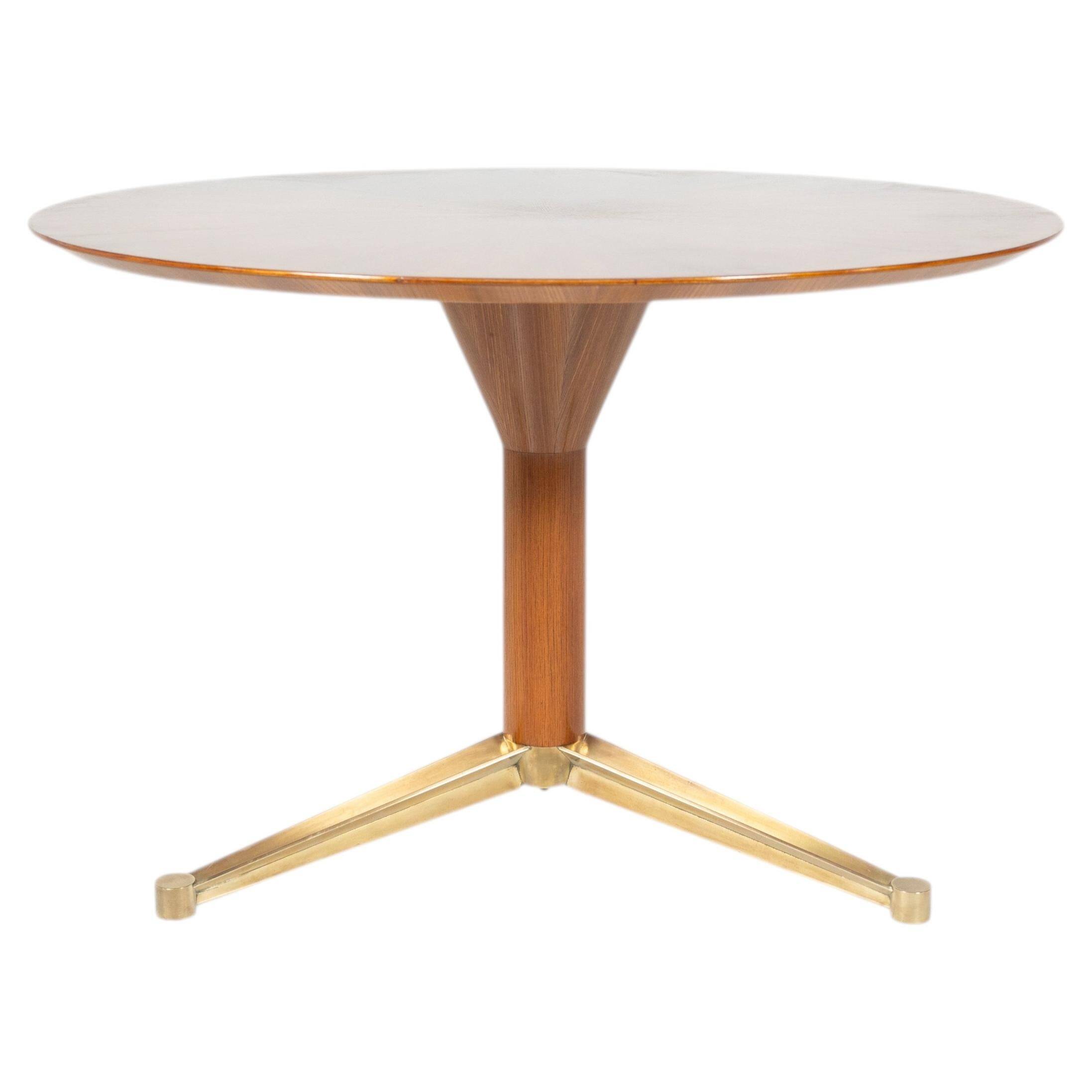 Dining table by Melchiorre Bega, brass and wood, Italy, 1950s.