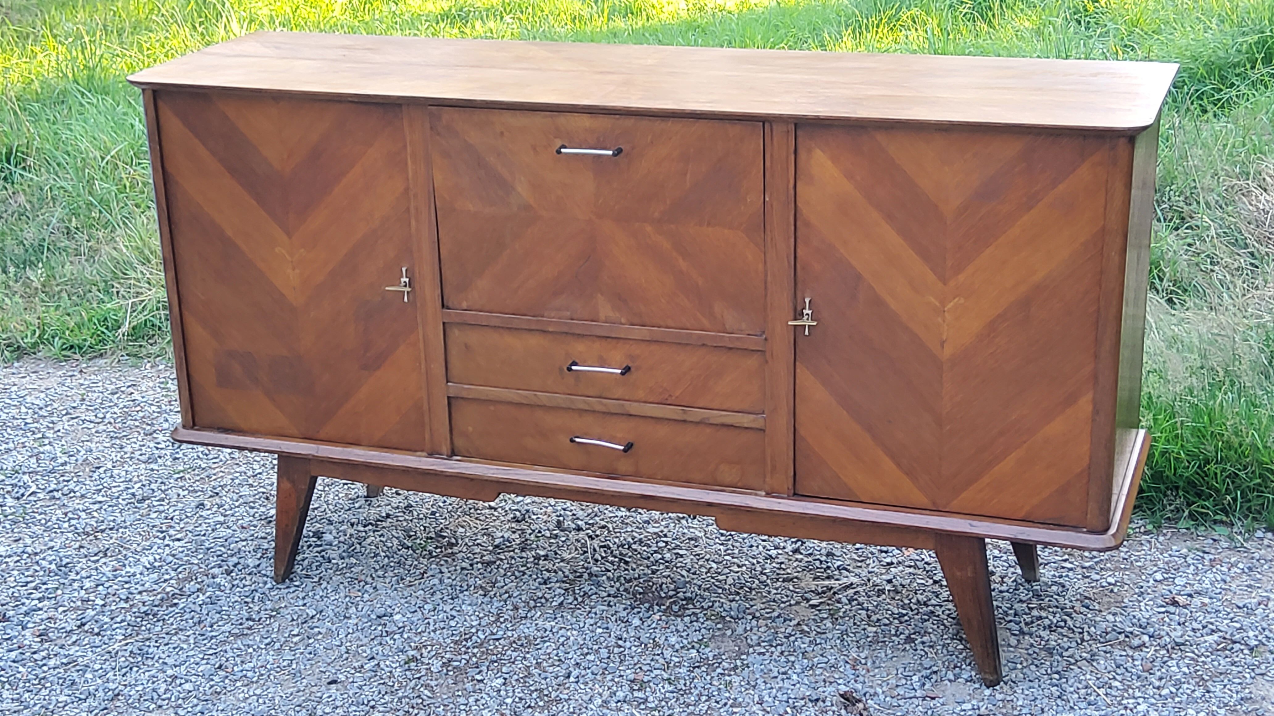 Vintage gold oak row feet compass from the 50s