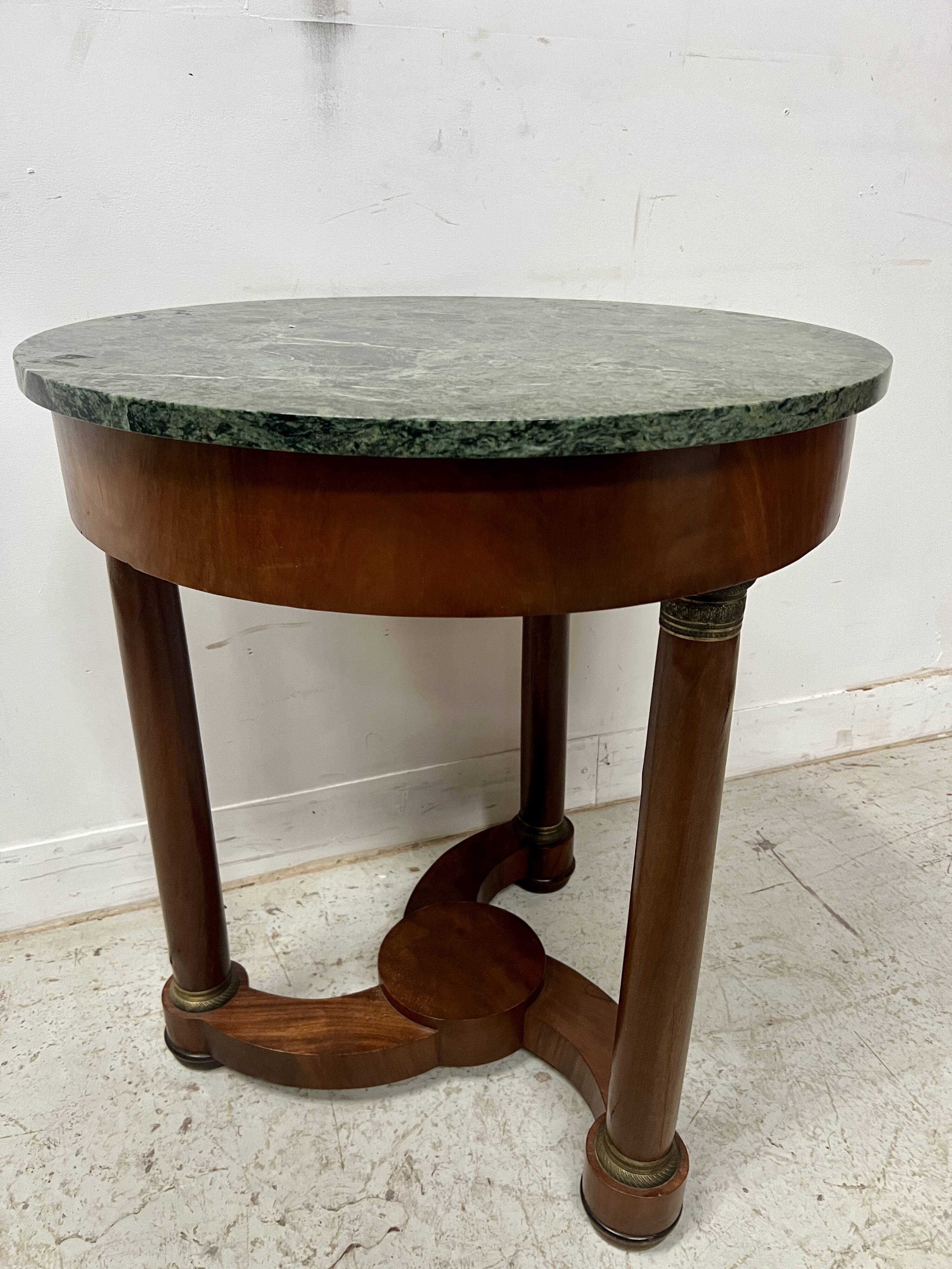 Round Empire-style side table in mahogany and veneer, 20th century
