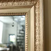 Louis XVI-style trumeau mirror with urn and dolphins – painted and gilded