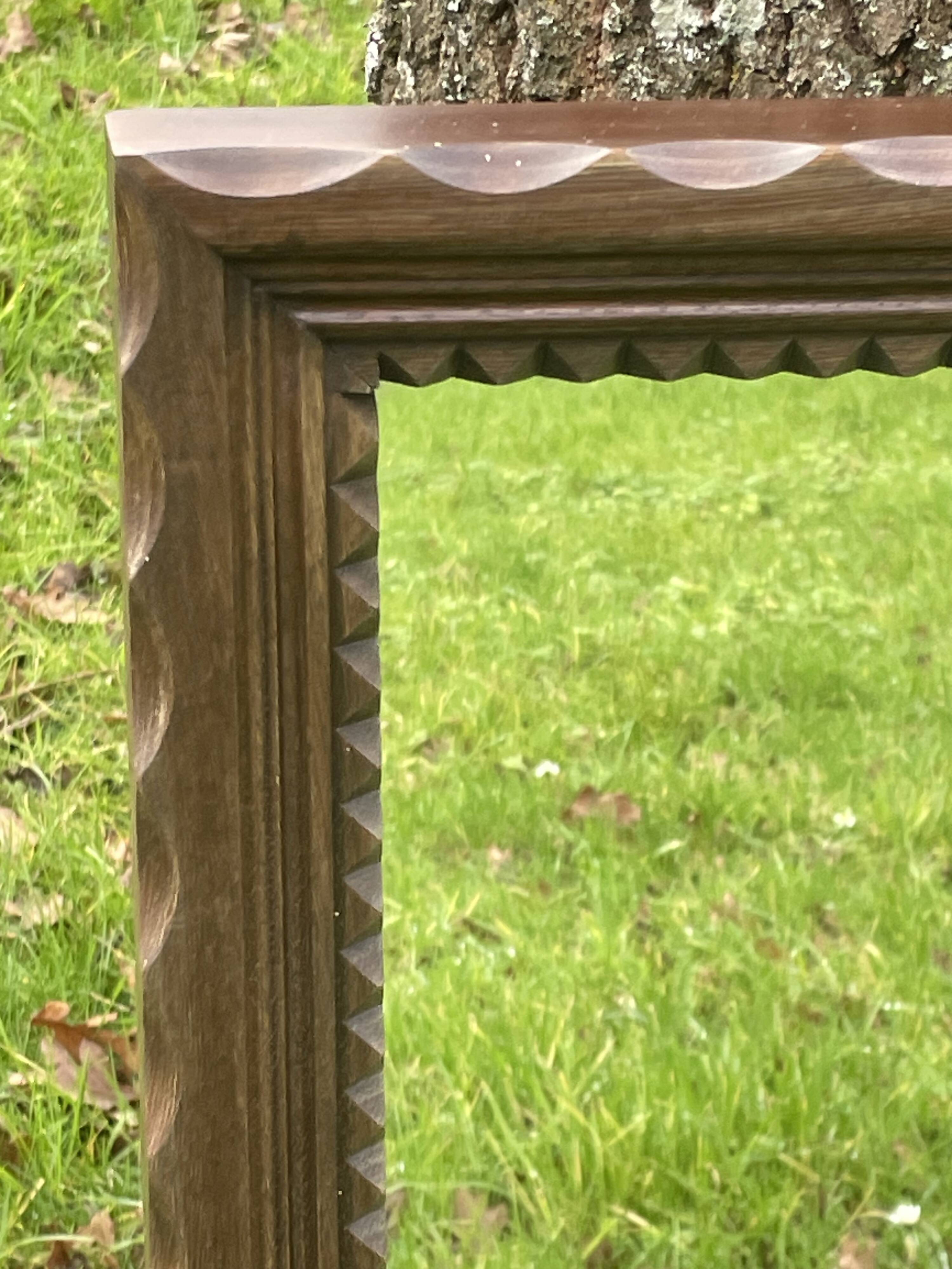 Rustic mirror called brutalist, molded carved natural wood