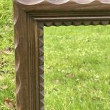 Rustic mirror called brutalist, molded carved natural wood