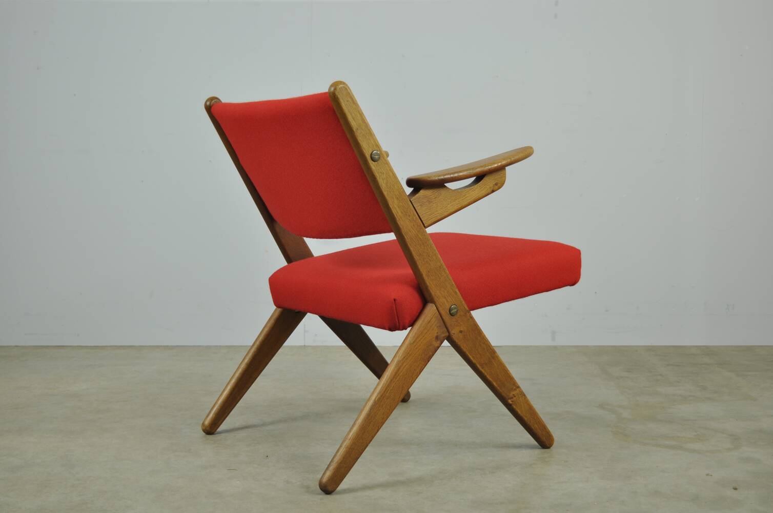 Classic Danish vintage scissor armchair by Arne Hovmand Olsen in OAK, 1960s