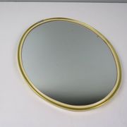 Vintage oval mirror – gold and elegance of the 50s-60s