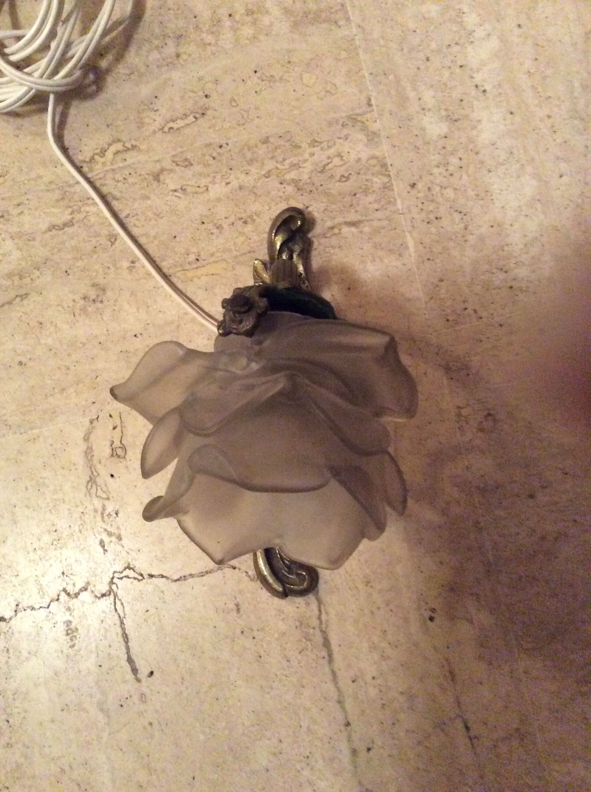 Old wall lamp in bronze and glass