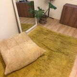 Large handmade wool rug from the 70s in lime green.