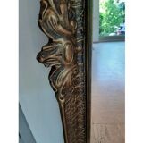 Baroque “trumeaux” mirror in carved solid wood.