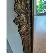 Miroir baroque "trumeaux" en bois massif sculpté.