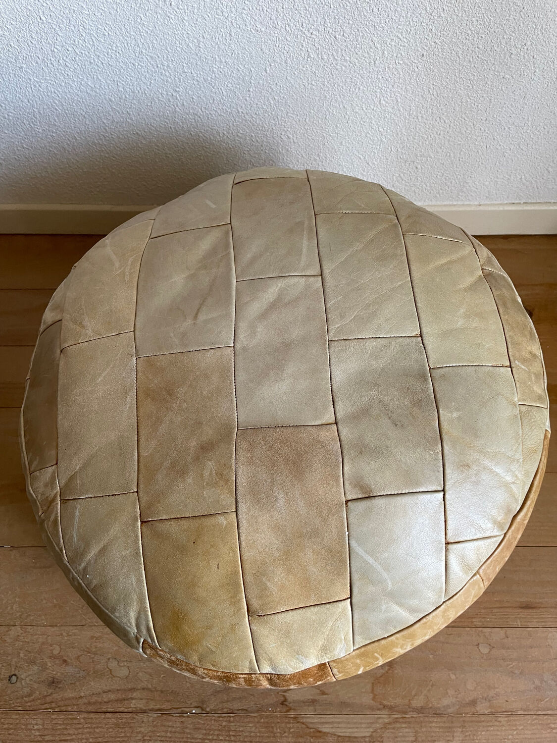 Brown and beige patchwork leather pouf from sede