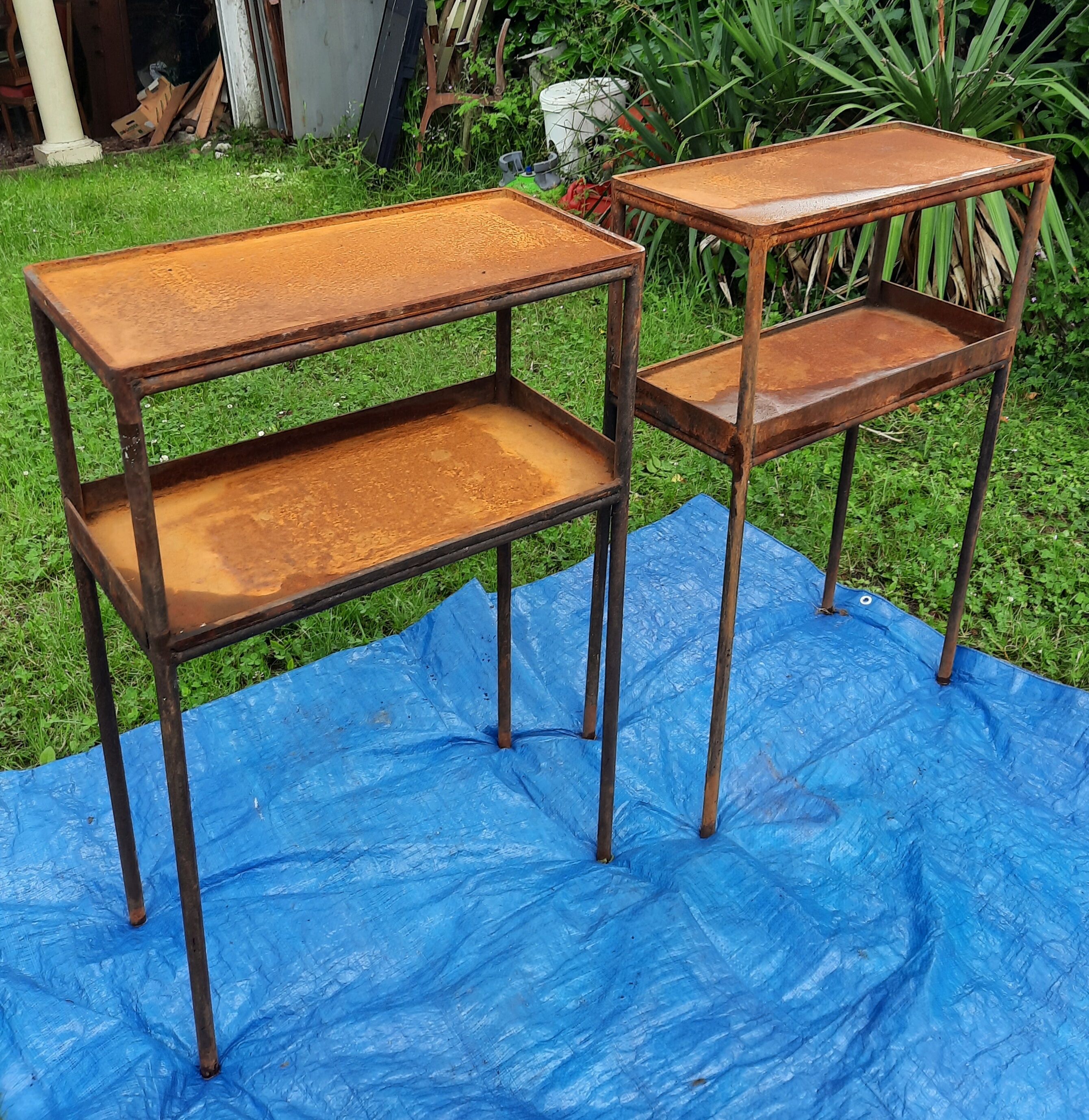 Pair of metal consoles