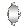 Vintage faceted mirror in brass frame