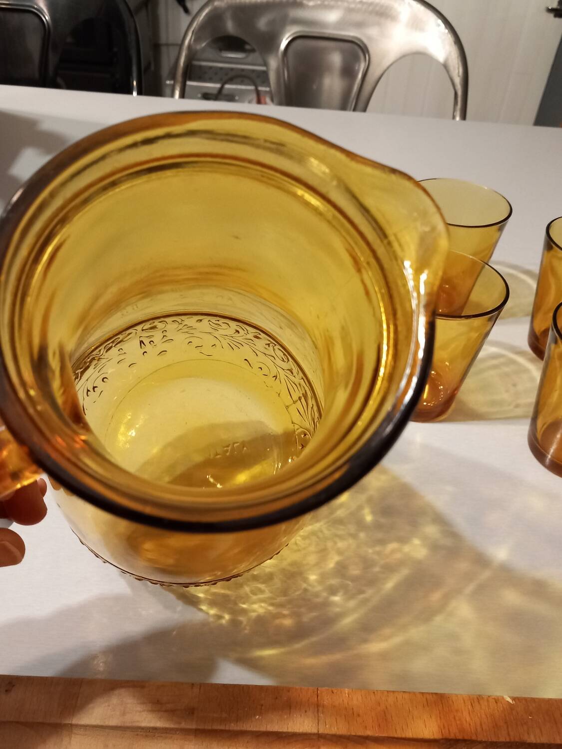 Italian pitcher service and 6 amber glasses