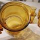 Italian pitcher service and 6 amber glasses