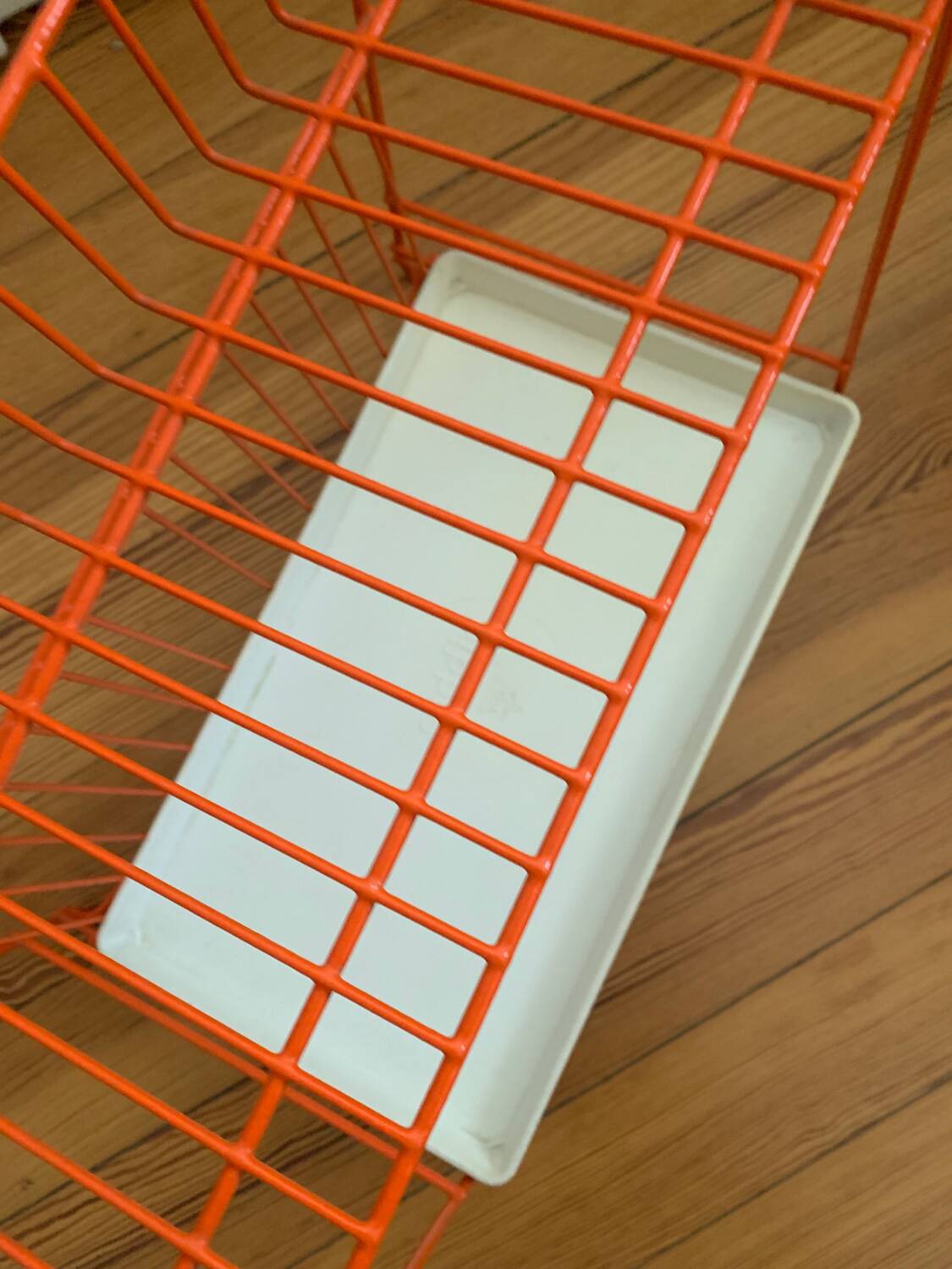 Authentic orange vintage metal drainer shelf from the Caddy brand