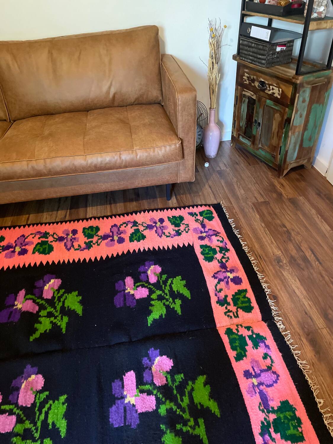 Oltenian floral rug handwoven in wool, purple flowers on black and pink background