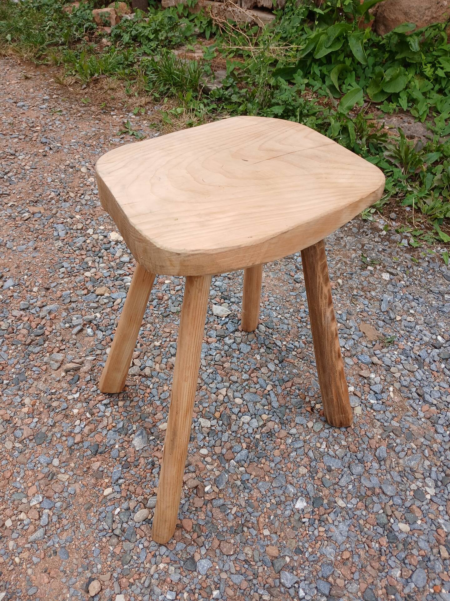 Antique stool in raw wood