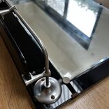 Vintage black mirror from the 1930s/40s with shelf.