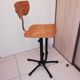 Industrial chair with height adjustment and foot rests