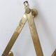Brass accordion coat rack