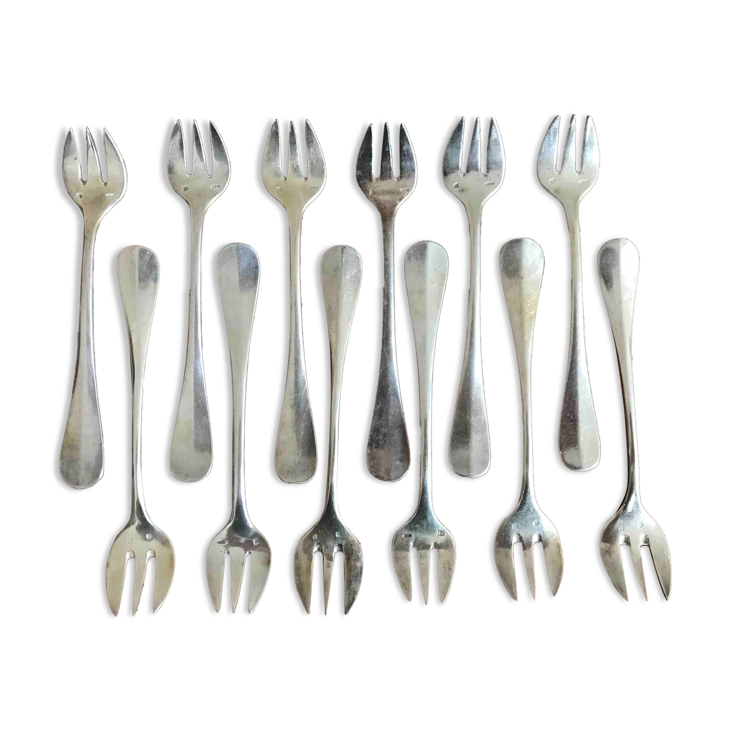12 Silver metal oyster forks in their box