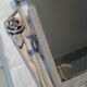 Former Wall coat hangers painted in gray iron