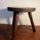 Tabouret tripode en bois